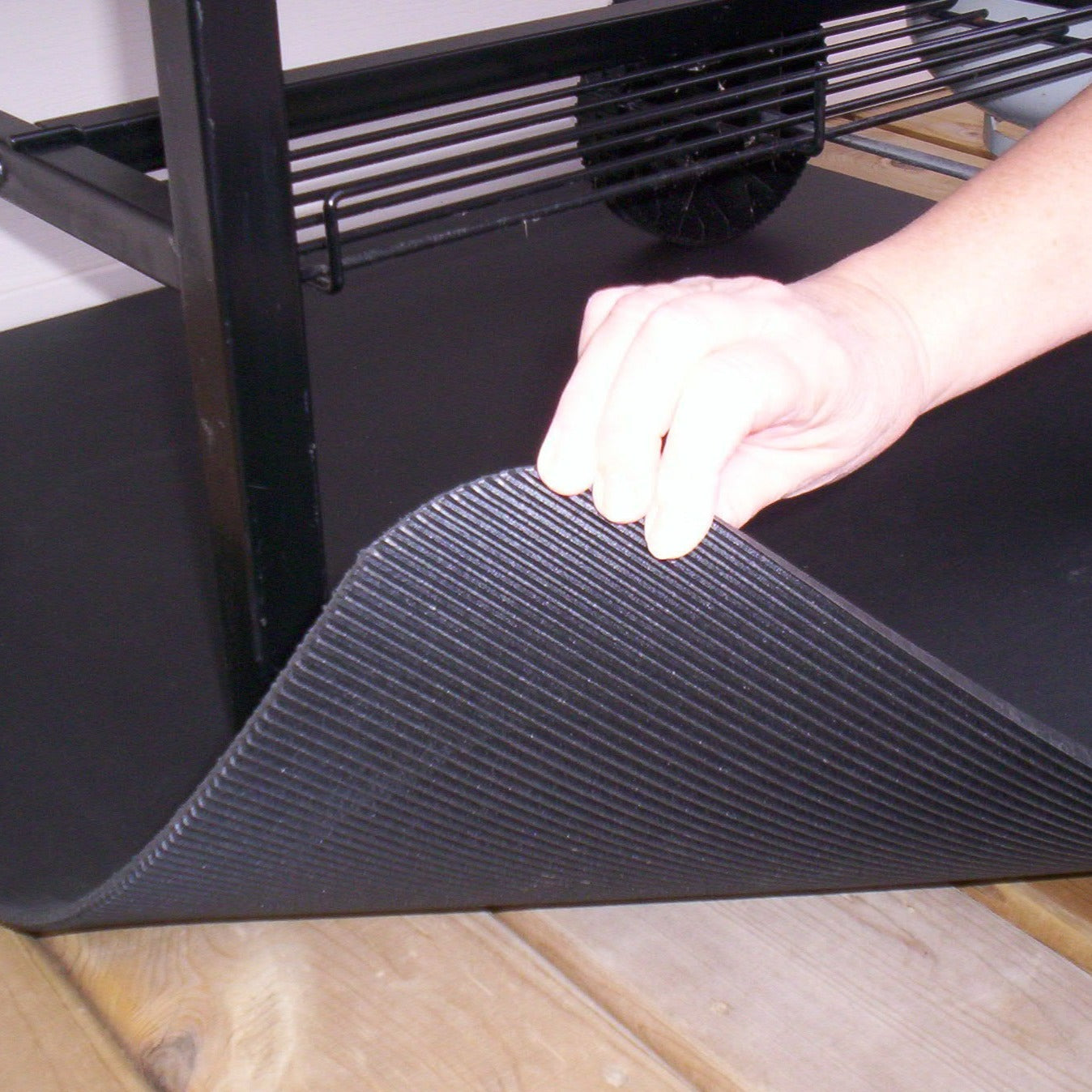 a photo showing a part of the mat being lifted so you can see the underside of the mat