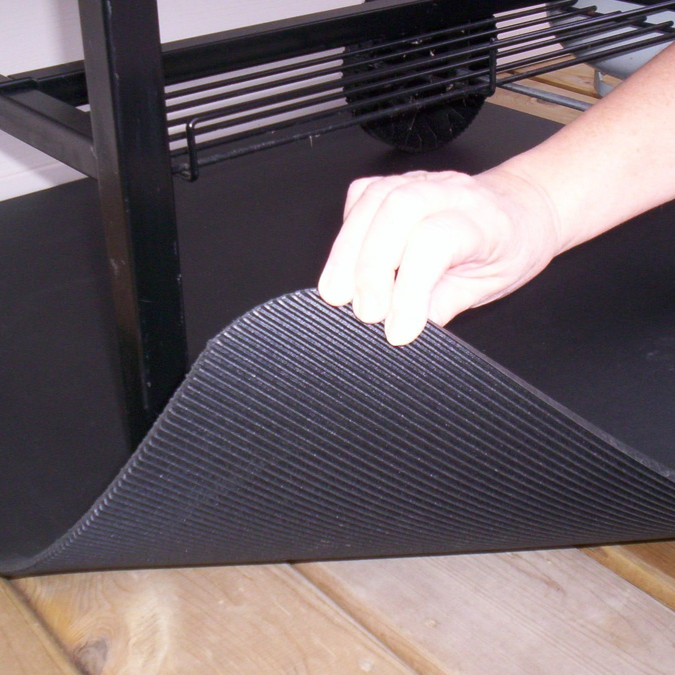 a photo showing a part of the mat being lifted so you can see the underside of the mat